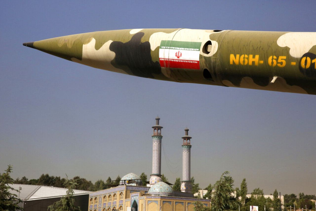 A missile is displayed at an exhibition on the 1980-88 Iran-Iraq war, at a park, northern Tehran, Iran, Thursday, Sept. 25, 2014.