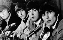A Beatles tagjai egy sajtótájékoztatón 1964-ben