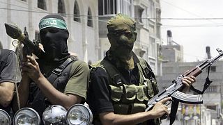 Archív fotó: Hamász-terroristák egy teherautón Gázavárosban