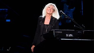 Christine McVie from the band Fleetwood Mac performs at Madison Square Garden on Monday, Oct. 6, 2014, in New York. 