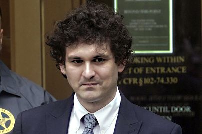 FTX co-founder Sam Bankman-Fried leaves federal court in New York, in June.