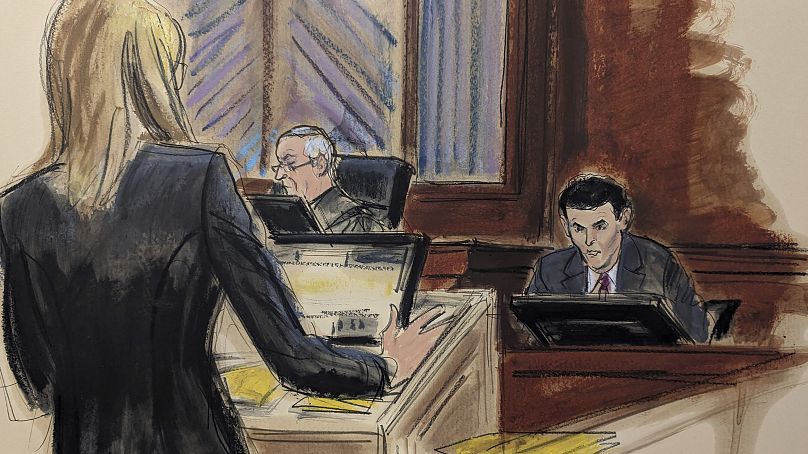 In this courtroom sketch, Sam Bankman-Fried, right, is cross-examined by assistant US attorney Danielle Sassoon, left, in Manhattan federal court in New York, on Thursday.