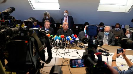 he President of the Spanish Episcopal Conference, Cardinal Juan Jose Omella, centre, speaks during a press conference in Madrid, Spain.