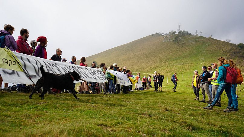 Activists protest the expansion of the ski area on Monte San Primo, 14 October 2023.