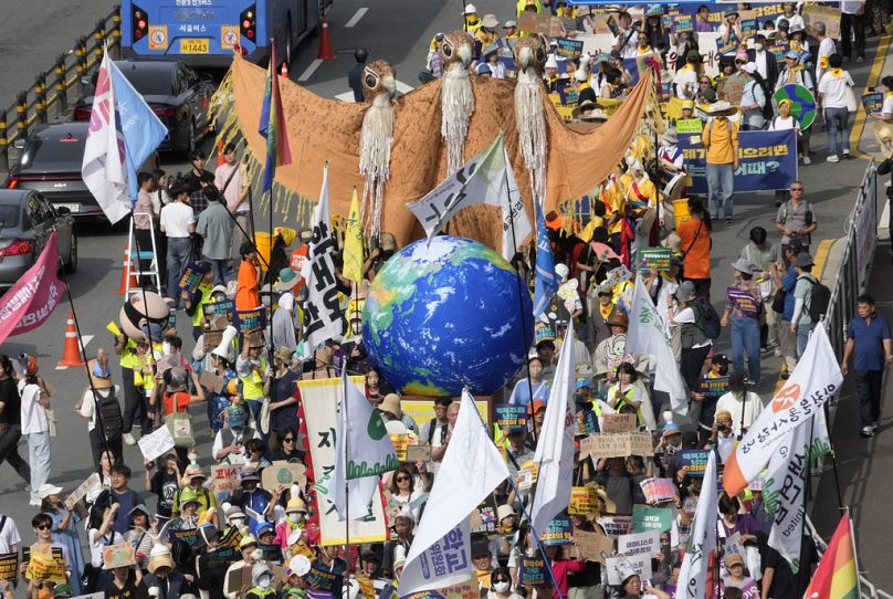 Climate protesters demand an end to fossil fuel use at a rally in Seoul, South Korea, September 2023.