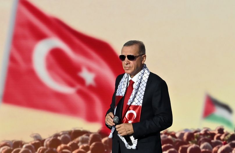 Turkish President Recep Tayyip Erdogan attends the ''Great Palestine Meeting'' at Ataturk Airport in Istanbul on Saturday