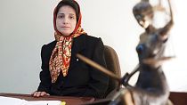 FILE: In this Nov. 1, 2008 photo, Iranian human rights lawyer Nasrin Sotoudeh, poses for a photograph in her office in Tehran, Iran.