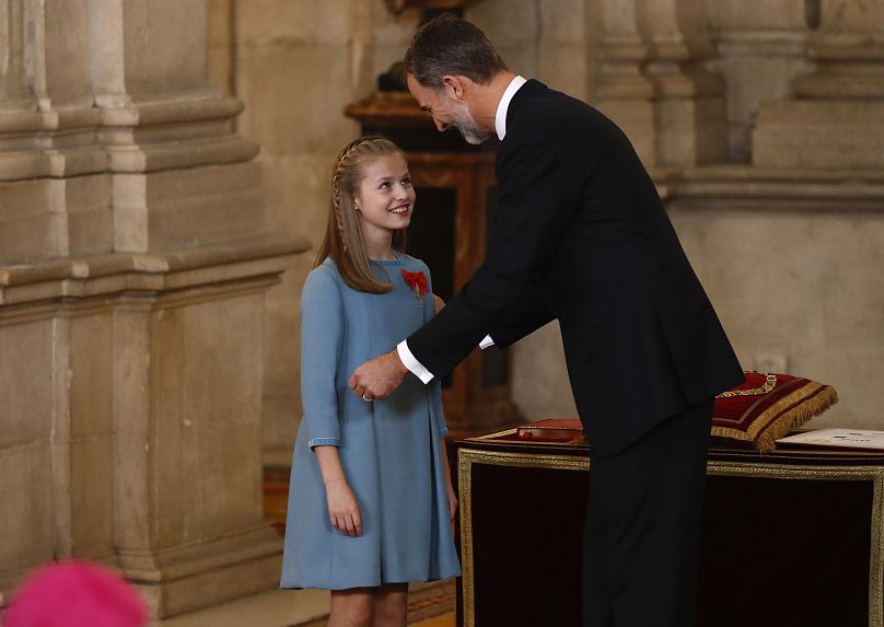 King Felipe of Spain presents his daughter with the Order of the Golden Fleece insignia at the Royal Palace in Madrid on 30 January 2018.