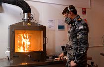 Image show a student at the University of New South Wales' new fire laboratory where researchers are developing more fire-resistant materials. 