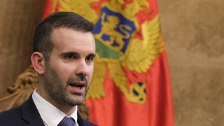 Montenegro's new Prime Minister Milojko Spajic speaks during a parliament session in Montenegro's capital Podgorica, Monday, Oct. 30, 2023. 