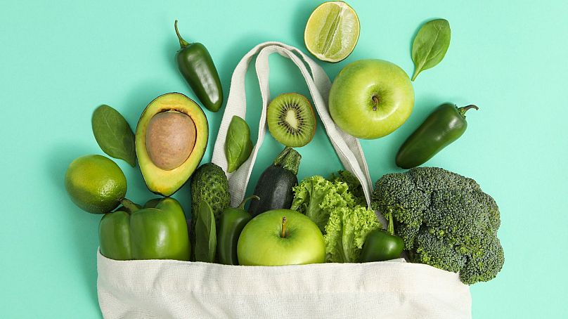 An assortment of green fruits and vegetables