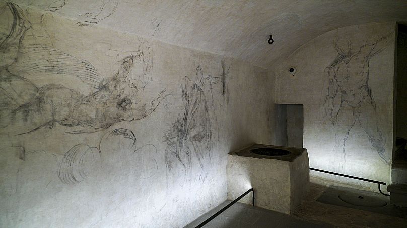 Delicate charcoal drawings that some experts have attributed to Michelangelo are seen on the walls of a room used to store coal until 1955 inside Florence's Medici Chapel