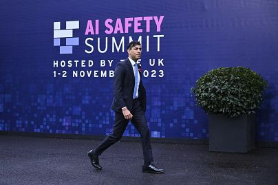 Britain's Prime Minister Rishi Sunak speaks to journalists upon his arrival for the second day of the UK Artificial Intelligence (AI) Safety Summit, at Bletchley Park.