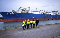 German Chancellor Olaf Scholz with officials in front of the LNG terminal in Lubmin, Germany. Jan. 14, 2023. 