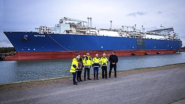 German Chancellor Olaf Scholz with officials in front of the LNG terminal in Lubmin, Germany. Jan. 14, 2023. 
