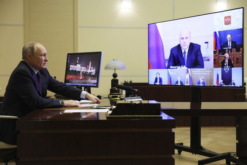 Russian President Vladimir Putin chairs a meeting on economic issues via videoconference at the Novo-Ogaryovo state residence outside Moscow, Russia, Wednesday, Nov. 1, 2023.