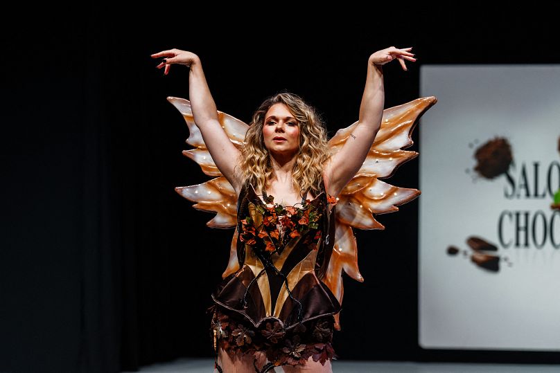 French vlogger Juju Fitcats walks the runway during the parade of chocolate dresses during the Salon du Chocolat de Paris 2023 in Paris on October 27, 2023.