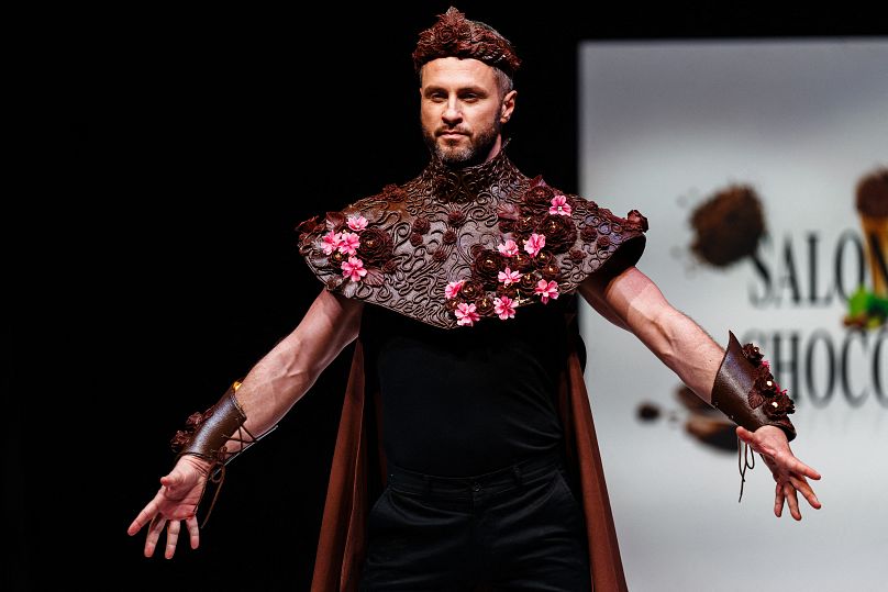 Canadian dancer Christian Millette walks the runway during the parade of chocolate dresses during the Salon du Chocolat de Paris 2023 in Paris on October 27, 2023.