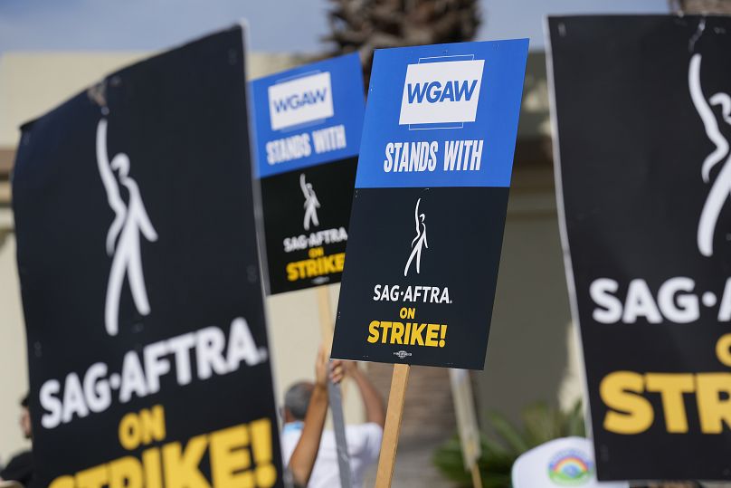 Picketers demonstrate outside Paramount Pictures studio on Wednesday, Sept. 27, 2023, in Los Angeles