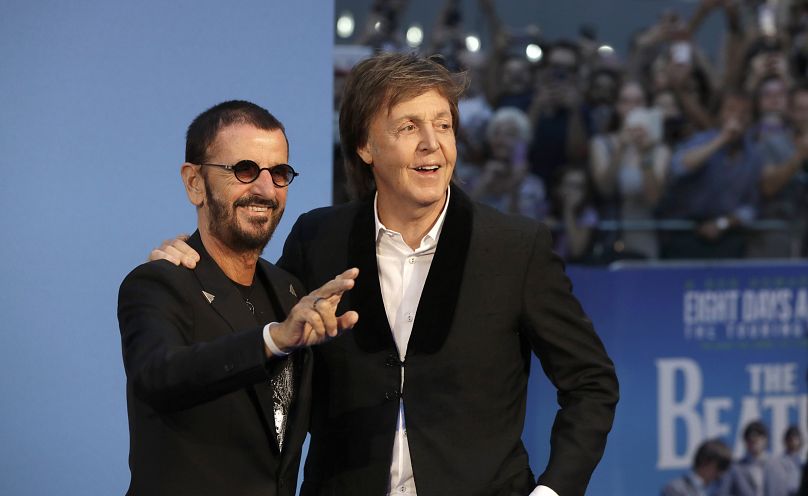 Paul McCartney, right, and Ringo Starr pose for photos at the World premiere of the film 'The Beatles, Eight Days a Week' in London, 15 September 2016.