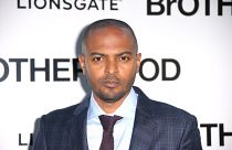 Actor and director Noel Clarke poses for photographers upon arrival at the premiere of the film 'Brotherhood' in London