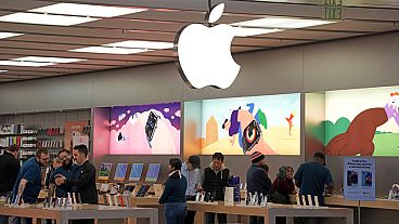 Customers shop in an Apple store in Pittsburgh. Jan. 30, 2023.