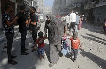 Palestinians evacuate wounded people following an Israeli airstrike in Bureij refugee camp, Gaza Strip, Thursday, Nov. 2, 2023. 