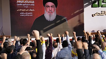 Hezbollah supporters attend rally as its leader Hassan Nasrallah addresses them. Beirut, Lebanon, November 3rd 2023
