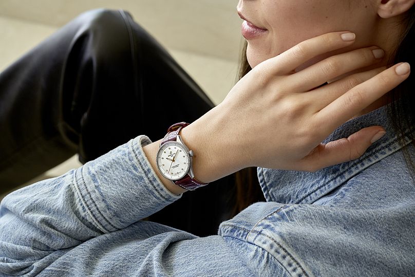 The times are changing - model wears Navitimer 32mm