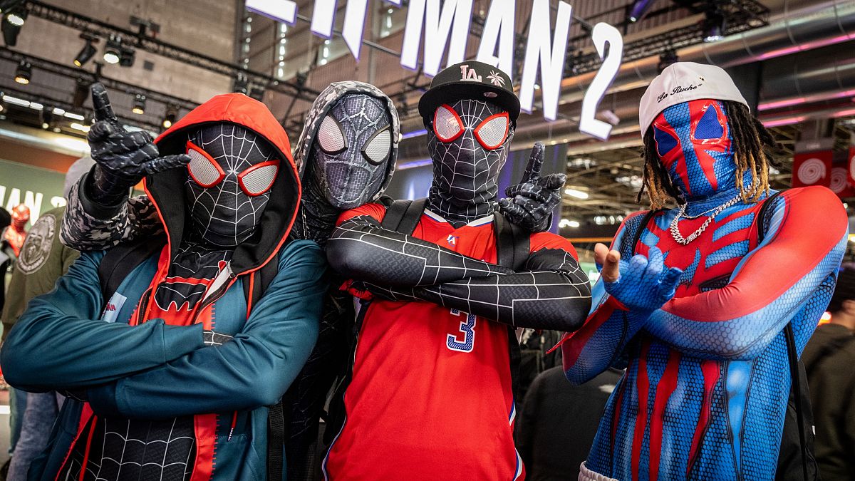 People dressed as Spiderman during the "Paris Games Week" fair in France, November 1, 2023.