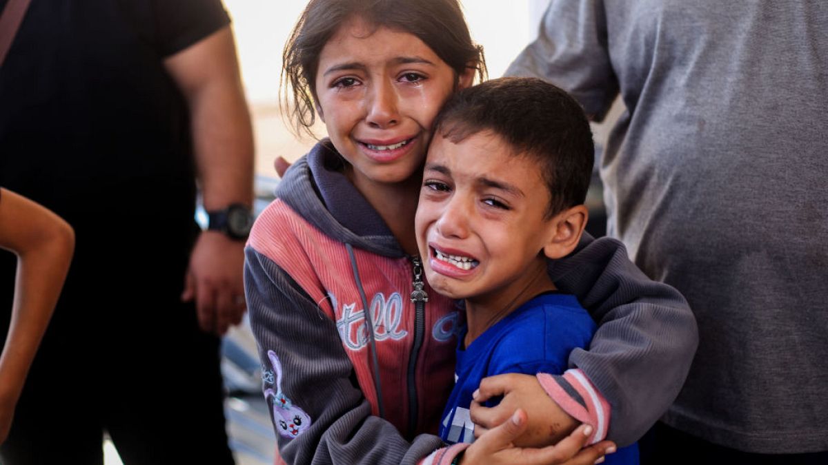 Children crying following Israeli air raids on Khan Yunis, Gaza