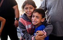 Children crying following Israeli air raids on Khan Yunis, Gaza