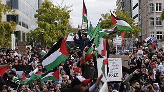 Protestors march during a demonstration, in solidarity with the Palestinian people in Gaza.