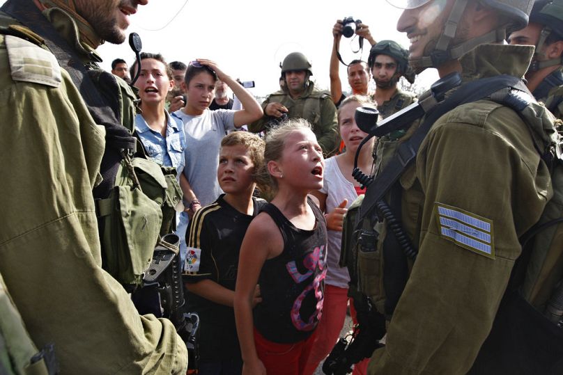 Ahid Tamimi, 14 yaşındayken İsrail askerlerine direnmiş ve bu hadiseden sonra uluslararası arenada tanınır hale gelmişti