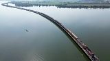 The floating train travels along Pasak Jolasid Dam, Thailand’s biggest reservoir in Lopburi province. The floating train travels along Pasak Jolasid Dam, Thailand’s biggest reservoir in Lopburi province.