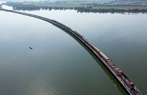The floating train travels along Pasak Jolasid Dam, Thailand’s biggest reservoir in Lopburi province.