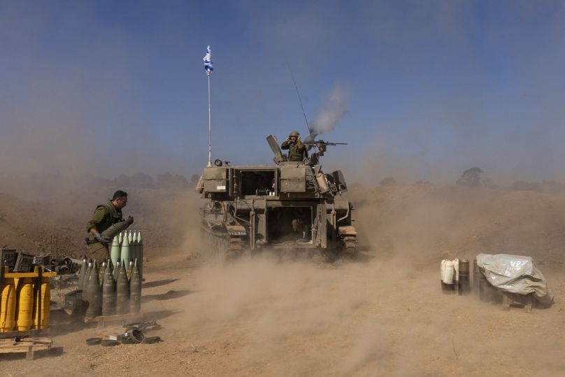 An Israeli mobile artillery unit fires a shell from southern Israel towards the Gaza Strip, in a position near the Israel-Gaza border, Monday, Nov. 06, 2023.