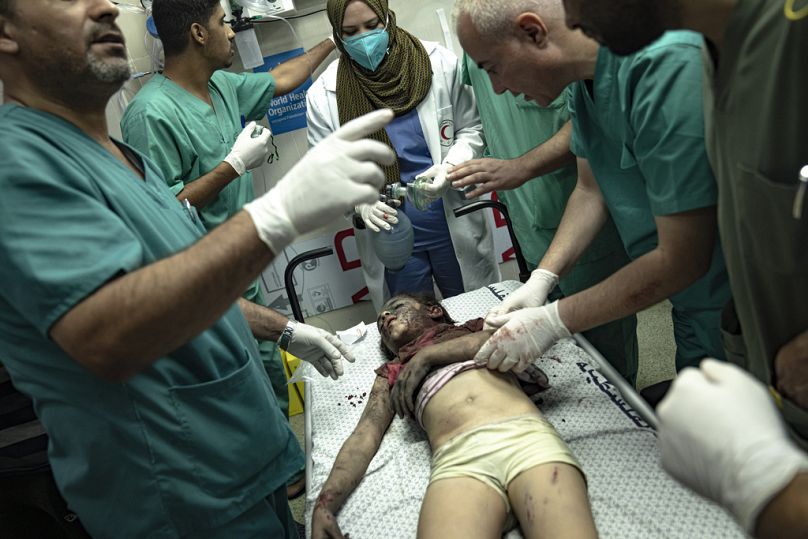 A young Palestinian girl is treated in a hospital after she was injured in an Israeli bombardment of the Gaza Strip in Khan Younis, Monday, Nov. 6, 2023.