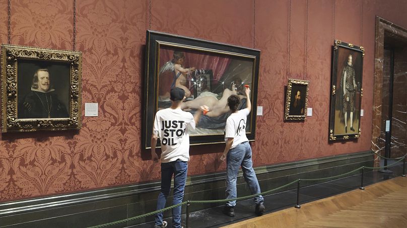 Climate activists smashing glass protecting Velazquez's Venus painting