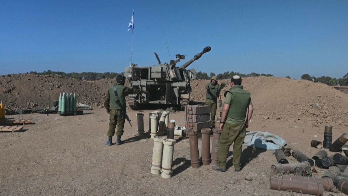 Israeli soldiers fire artillery into Gaza
