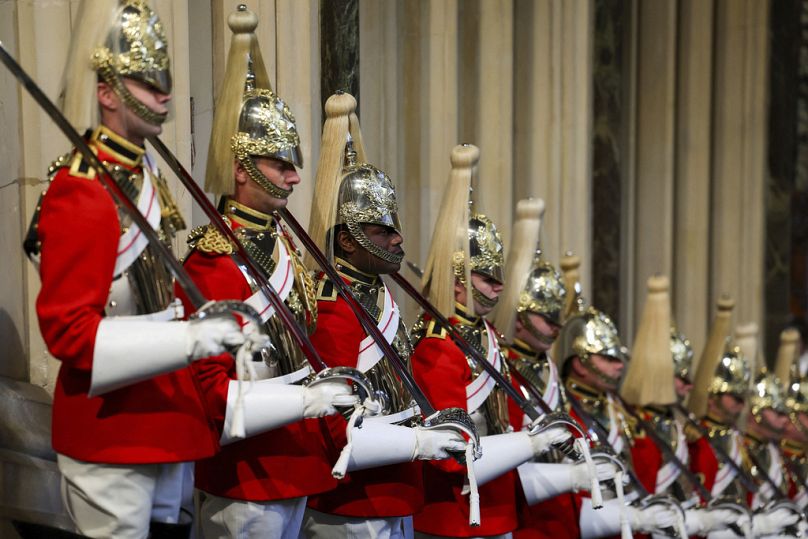 Members of the Household Cavalry stand guard at the Norman Porch ahead of the State Opening of Parliament at the Houses of Parliament in London, Tuesday, Nov. 7, 2023.