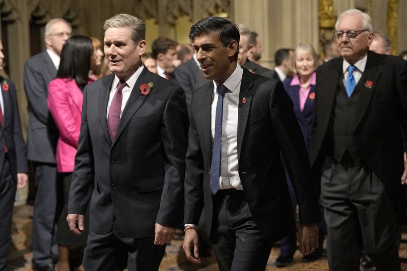 Britain's Prime Minister Rishi Sunk, right, and Labour Party leader Keir Starmer at King's Speech to parliament, 7 November 2023