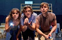 Isabella Pappas as Joyce Maldonado, from left, Oscar Lloyd as James Hopper Jr. and Christopher Buckley as Bob Newby in the rehearsal room of “Stranger Things: The First Shadow