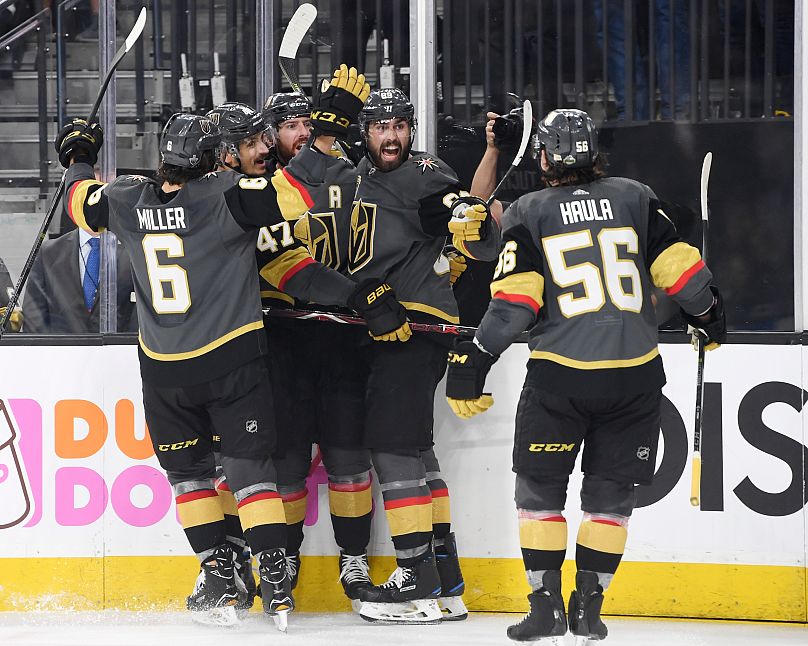 Vegas Golden Knights players celebrate James Neal's goal against the Winnipeg Jets during Game 3 of their NHL hockey Western Conference Final game