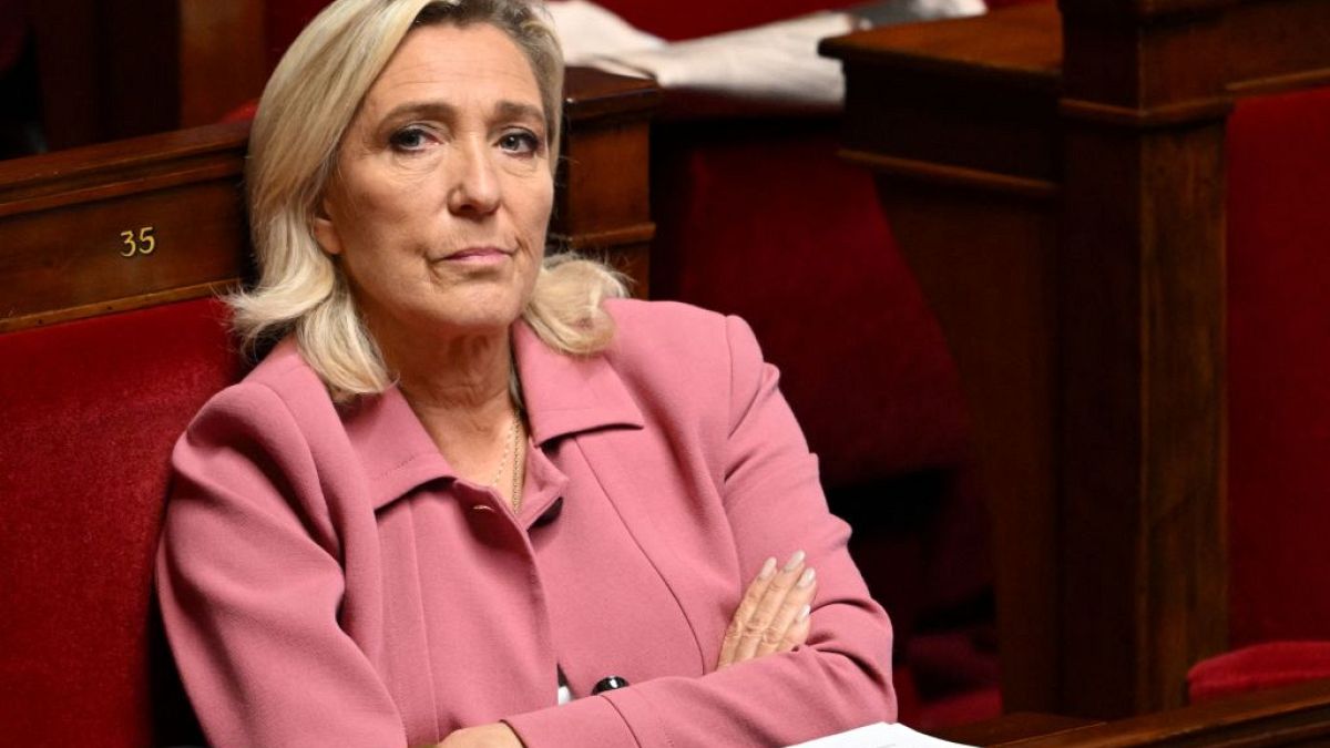 Marine Le Pen listens during a session on the situation in the Middle East at the French National Assembly in Paris on 23 October