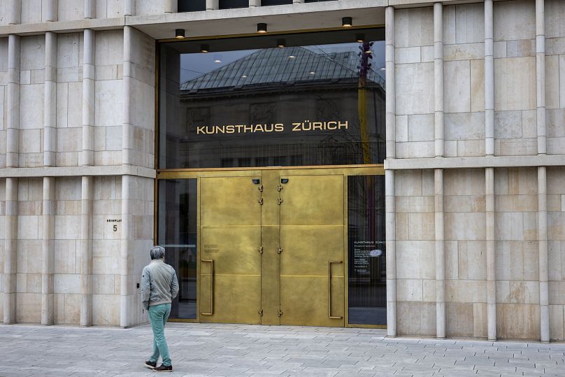A man walks past the entrance of the Kunsthaus Zurich art museum on March 14, 2023.