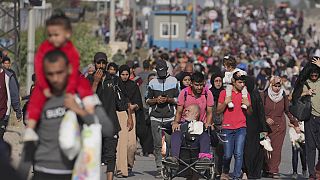Palestinians flee to the southern Gaza Strip on Salah al-Din Street in Bureij, Gaza Strip, on Wednesday, November 8, 2023.