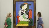 The painting "Femme a la montre" by French artist Pablo Picasso in 1932, is on display during a media preview of Sotheby's auction, in London, Friday, Oct. 6, 2023. 