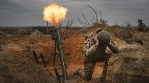 Soldiers of Ukraine's National Guard 1st brigade Bureviy (Hurricane) practice during combat training at a military training ground in the north of Ukraine Wednesday, Nov. 8.
