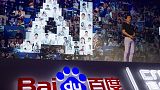 Robin Li, CEO des Suchmaschinenriesen Baidu, spricht während einer Veranstaltung in Peking über KI.
